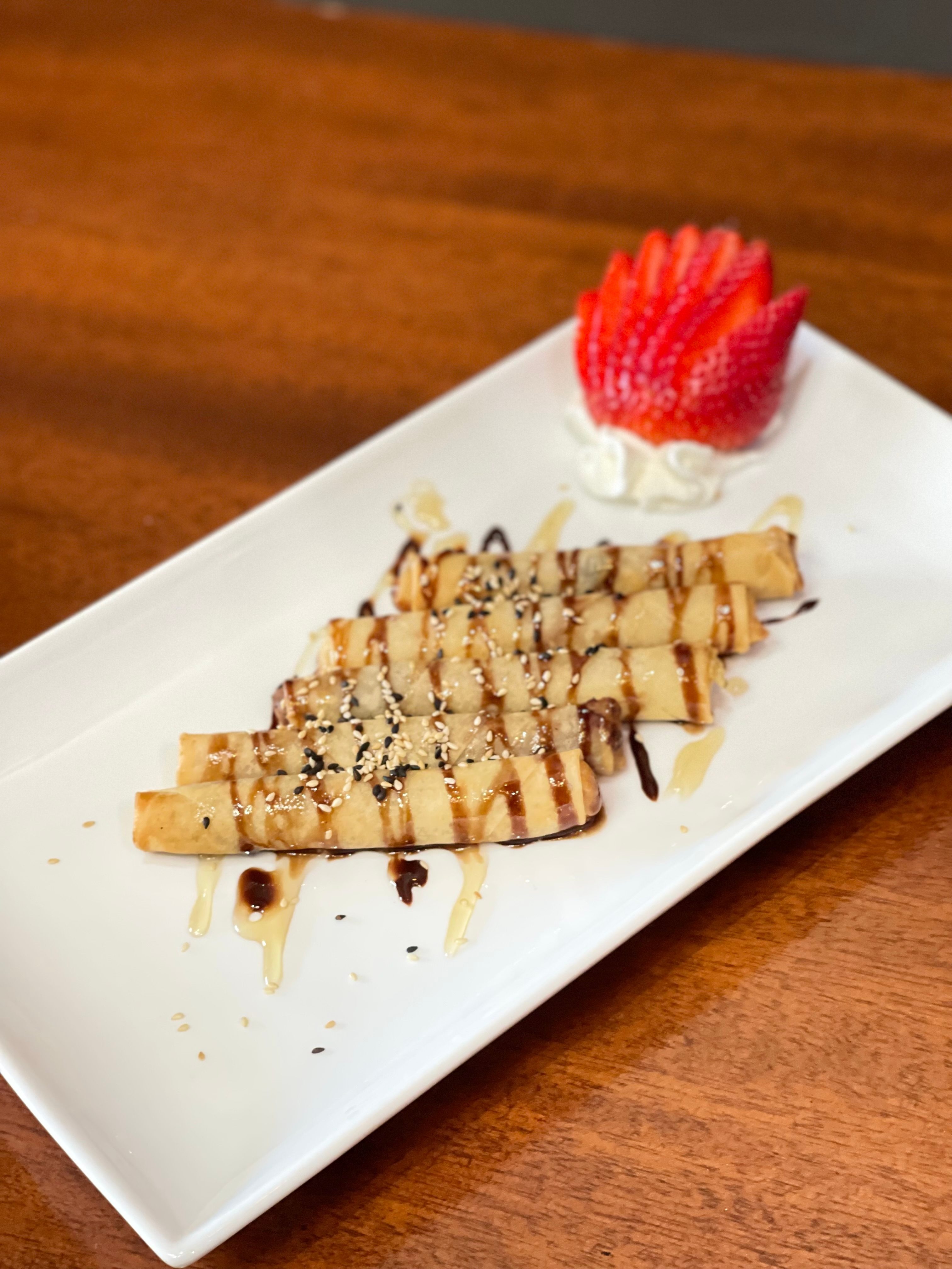Chocolate Bananas Stick with vanilla ice cream.